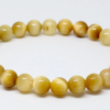Bracelet boule 8mm oeil de tigre doré AA 22g