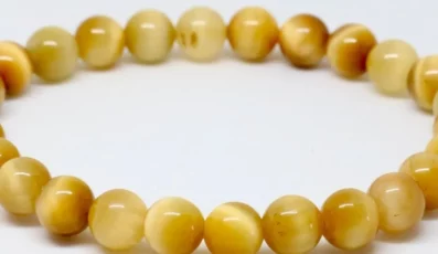 Bracelet Boule œil de Tigre Dorée