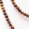 Collier boule 6mm Oeil de tigre A. 25g