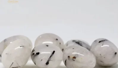 Pierre Roulée cristal de roche tourmaline ronde AA Brésil