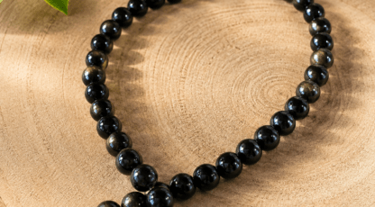 Fil de perles en Obsidienne oeil céleste AA